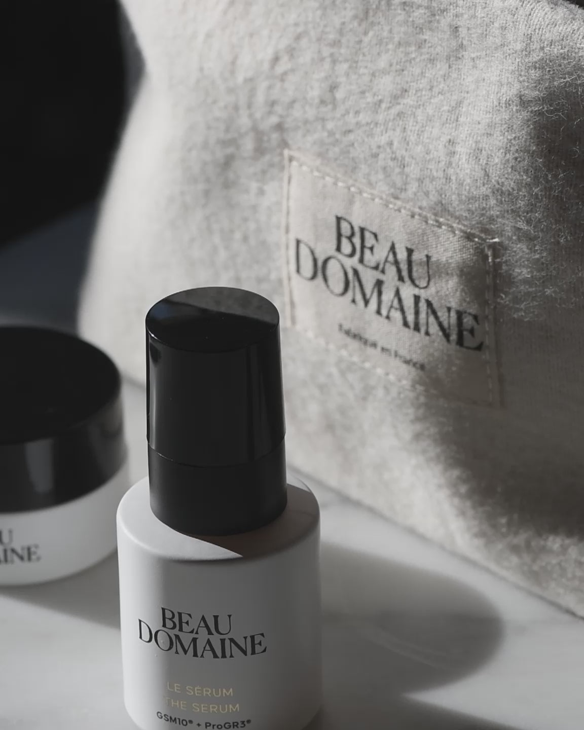 Video of a woman taking the products in The Discovery Routine with The Cleansing Emulsion, The  Serum and The Fluid Cream as well